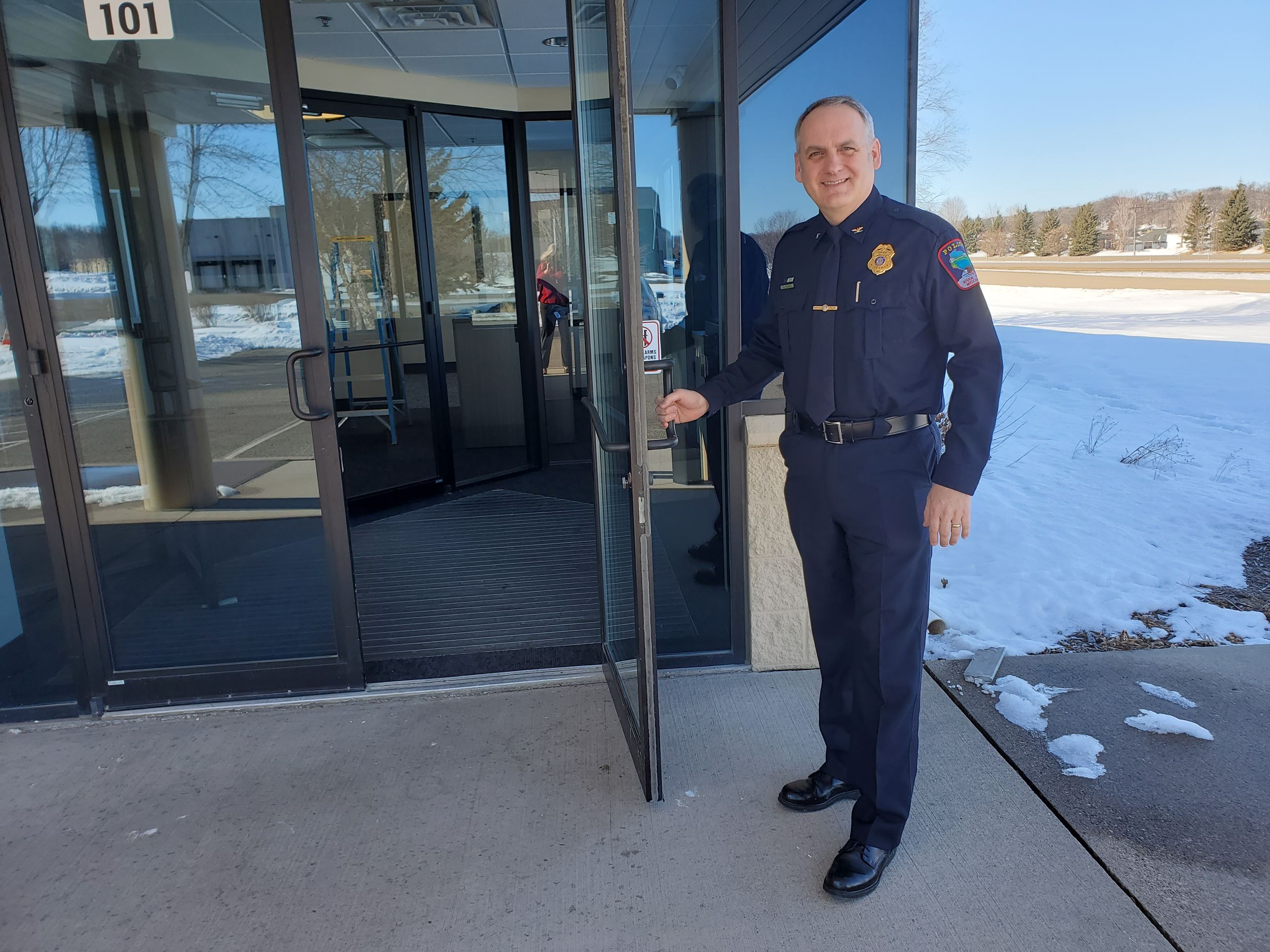 Chief Young holding PD Door